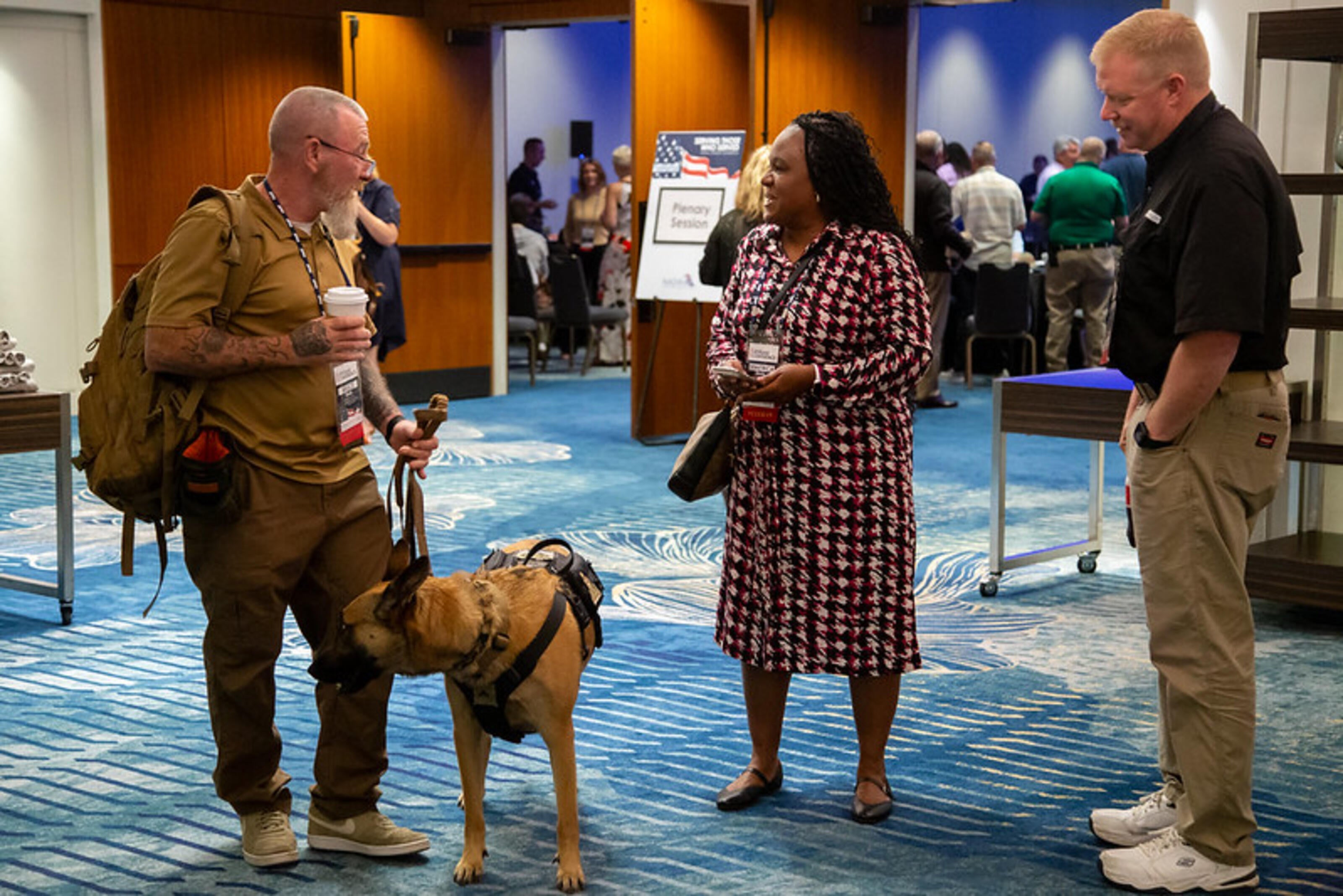 Attendees with service dog at 2026 Veterans Conference