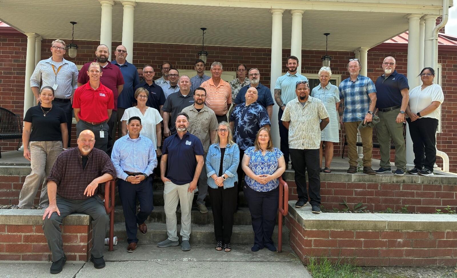 Lori Adams with group at Iowa Workforce Development Vets Conference.jpg