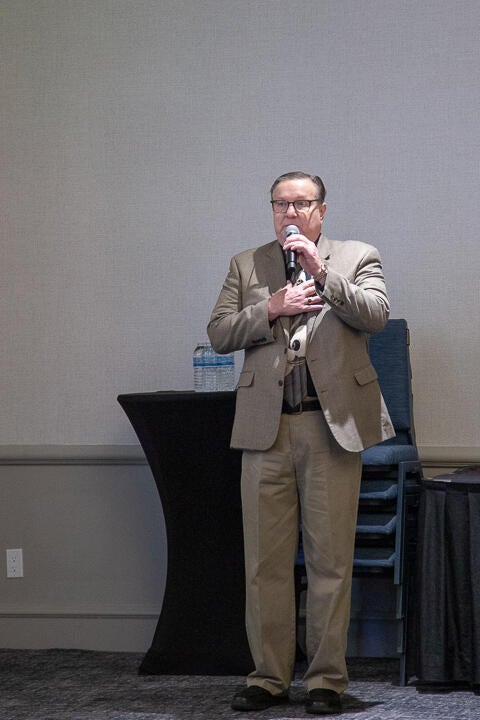 Jerry Pectol (NASWA) sings National Anthem