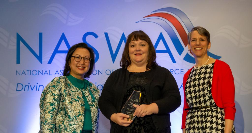 Accepting the William J. Harris Equal Opportunity Award, Suzi Levine, Commissioner, and Teresa Eckstein, Equal Opportunity Officer and Diversity Manager, Washington State Employment Security Department, pose with Anna Hui, NASWA Board President.